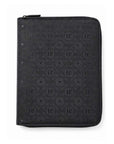 A black zippered travel jewelry organizer case featuring an embossed geometric pattern with repeating 'H!' monograms and small heart details, shown on a plain white background.