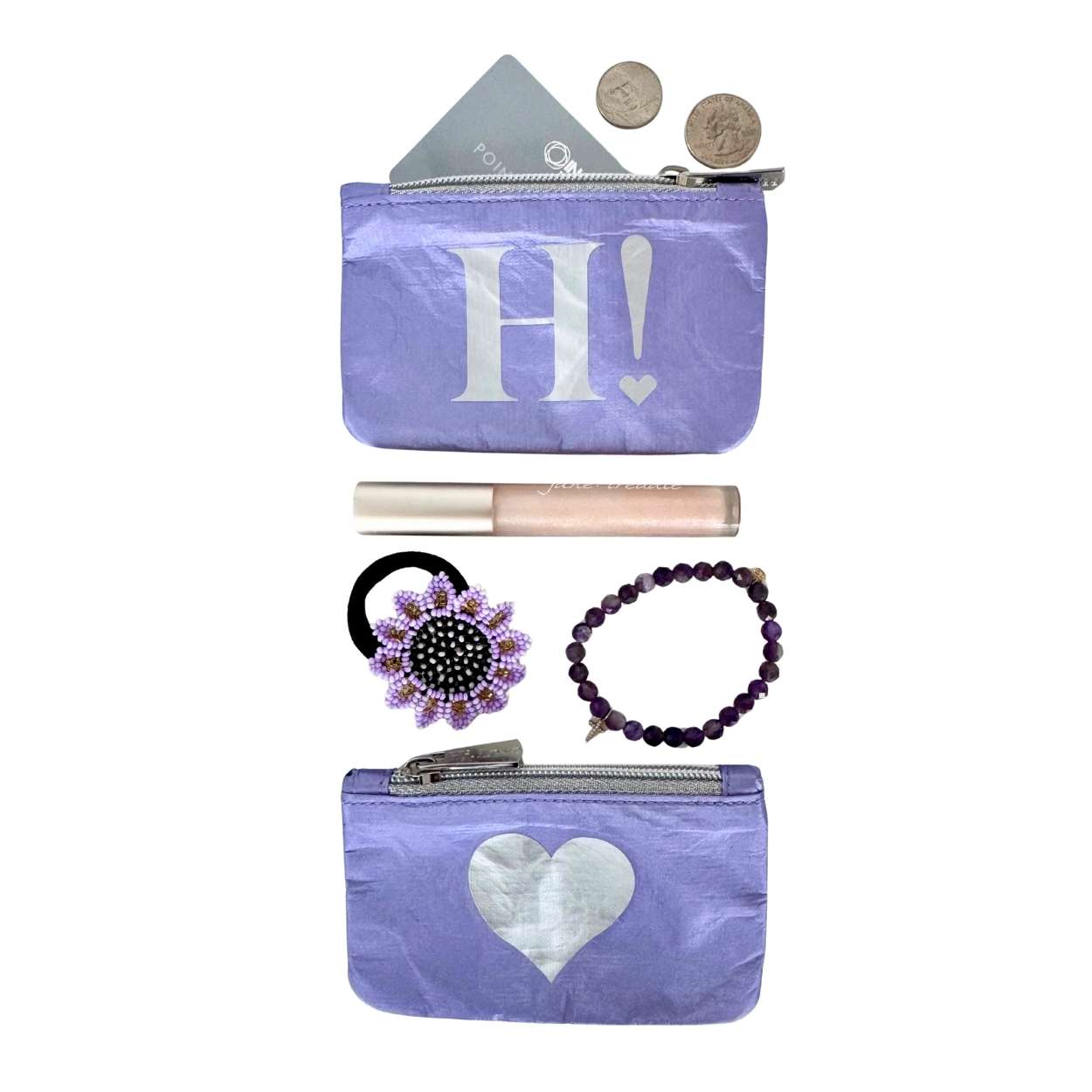 Purple pouch with 'H!' and heart design, containing coins, a lip balm, hair tie, and bracelet on a white background.