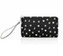 Black zip wristlet with white star, moon, and heart pattern on a white background