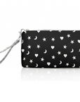 Black zip wristlet with white star, moon, and heart pattern on a white background