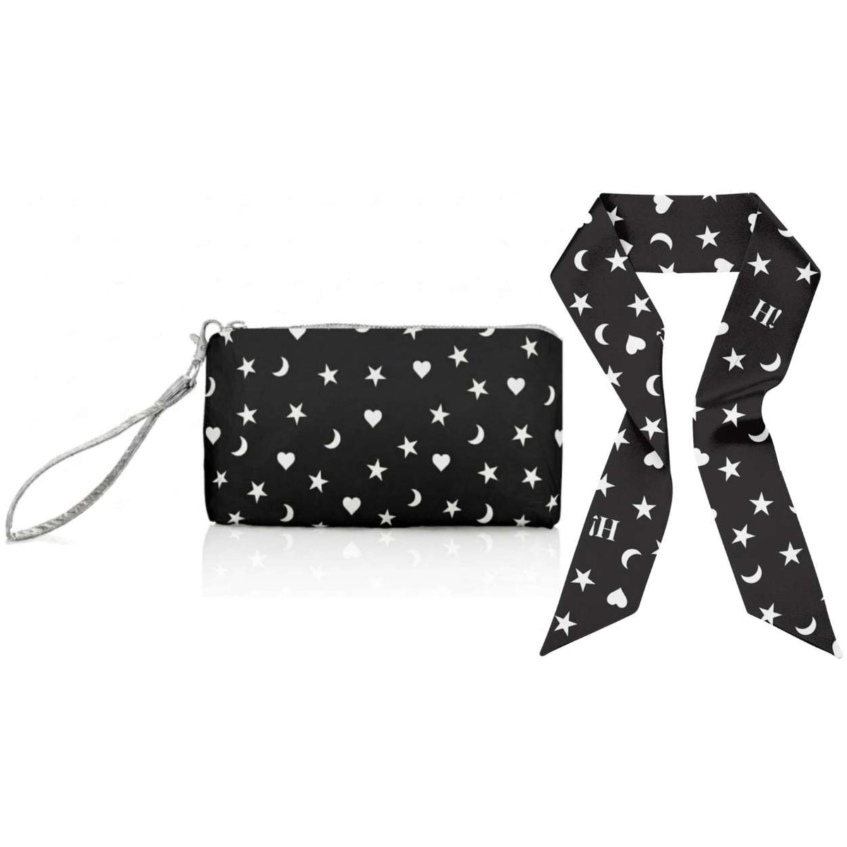 A black wristlet pouch with a silver wrist strap, decorated with a white celestial pattern of stars, moons, and hearts, shown next to a matching black and white silk scarfette on a white background.