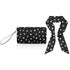 A black wristlet pouch with a silver wrist strap, decorated with a white celestial pattern of stars, moons, and hearts, shown next to a matching black and white silk scarfette on a white background.