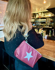Burgundy zip wristlet with silver star