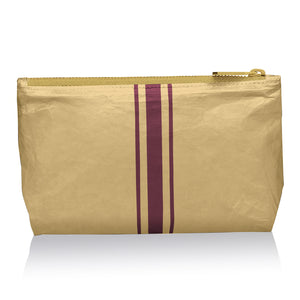 Cosmetic pack in gold with cabernet stripes 