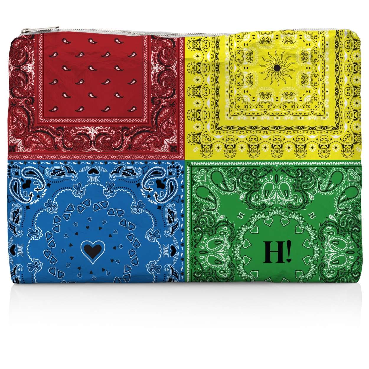 Colorful bandana-patterned clutch bag with red, yellow, blue, and green sections on a white background.