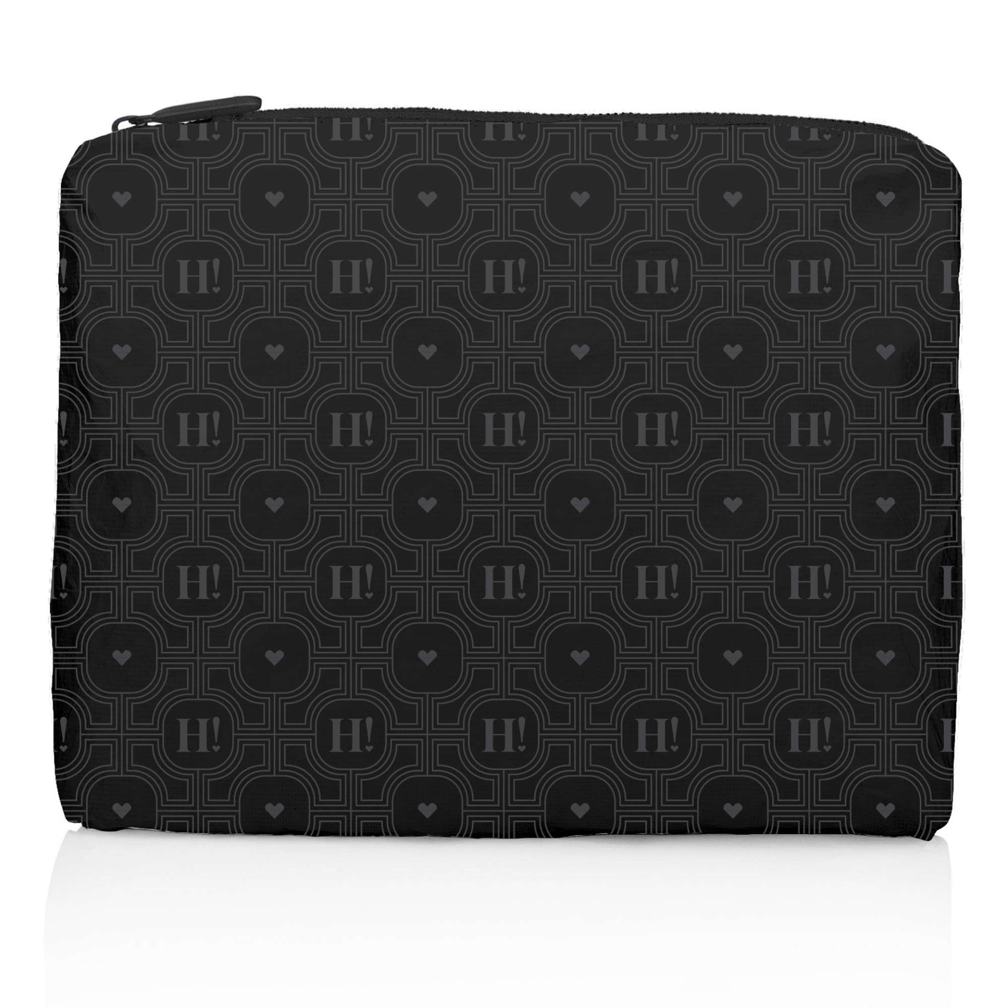 Black Signature Medium Travel Zip Pouch featuring the tonal Signature Hi Print and a lightweight, water-resistant design for travel and everyday organization.