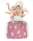 Medium zipper pouch in blush pink dancing ballerinas pattern with ballet shoes inside