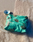Sea green zipper pouch with turtles pattern on the sand
