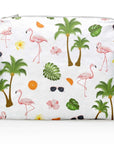 Pouch with tropical pattern featuring flamingos, palm trees, and oranges on a white background