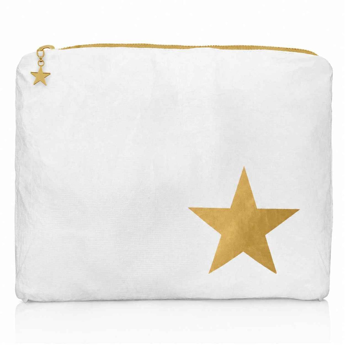 Medium zip pouch in shimmer white with gold star and gold star accent on zipper on white background.