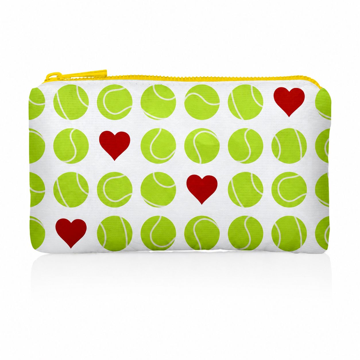A white zippered mini pouch featuring a repeating pattern of green tennis balls and red hearts, with a yellow zipper.