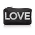A black zippered cosmetic pouch with the word 'LOVE' printed in large, bold, silver glitter letters across the front, set against a plain white background with a soft reflection below.