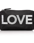 A black zippered cosmetic pouch with the word 'LOVE' printed in large, bold, silver glitter letters across the front, set against a plain white background with a soft reflection below.