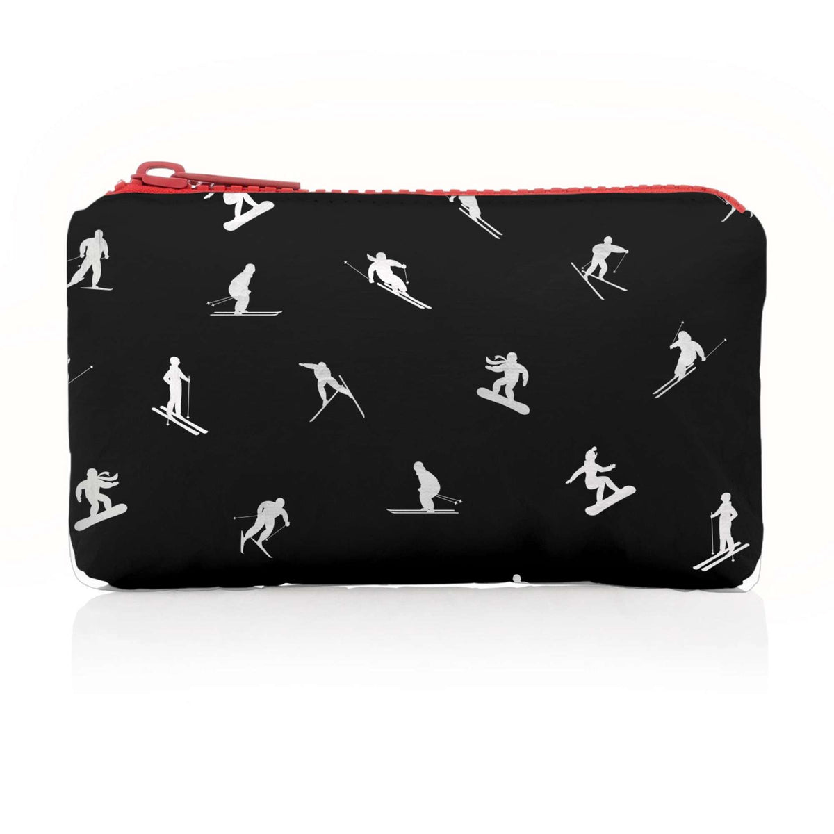 A black and white zippered mini pouch featuring a pattern of skiers and snowboarders, with a red zipper pull and red zipper trim, shown on a white background.
