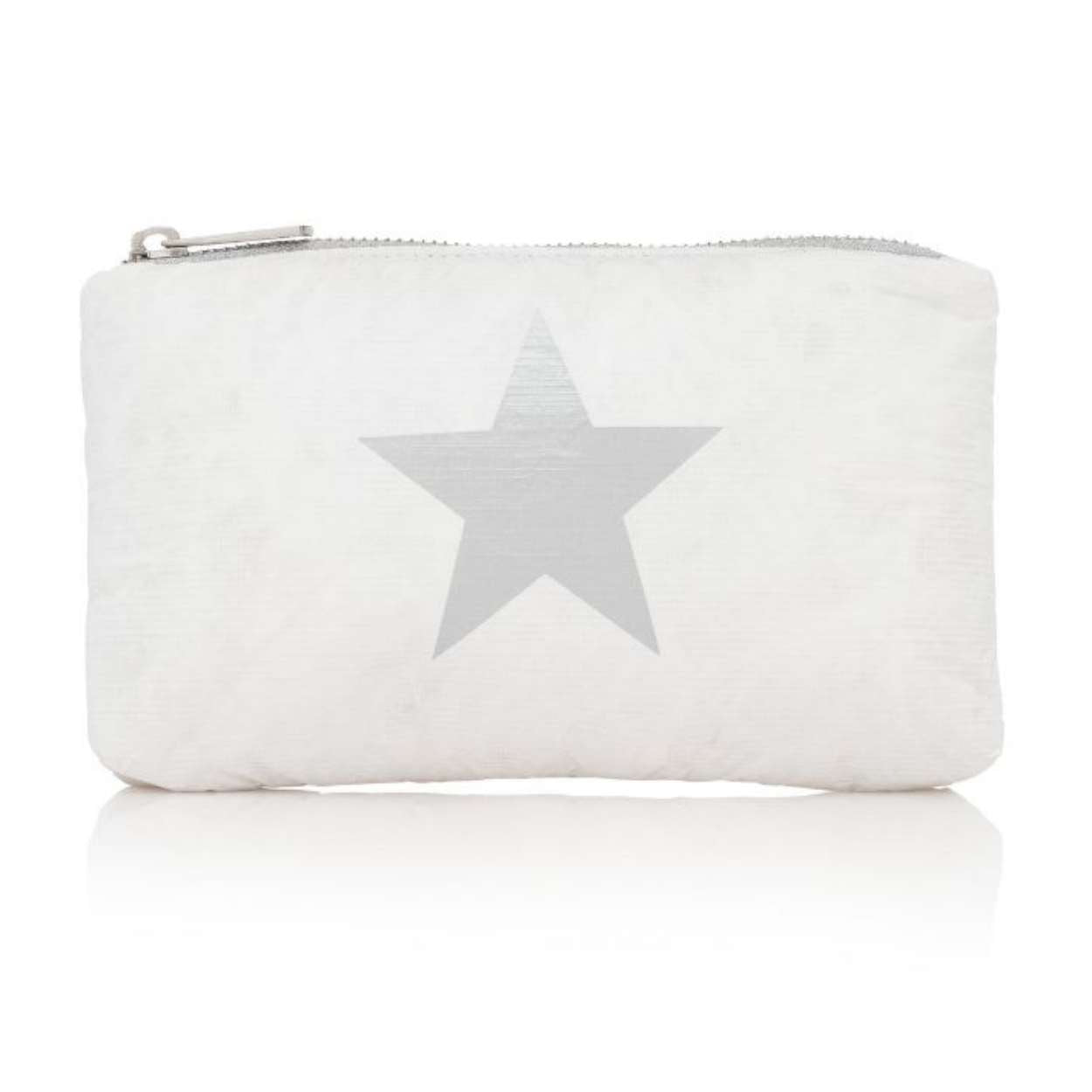 A shimmer white travel pouch with a silver star detail on the front and a zipper closure on white background
