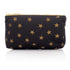 Black mini zipper pouch with myriad of gold stars on white background
