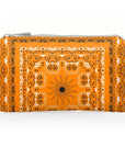 Mini zipper pouch in orange bandana print on a white background