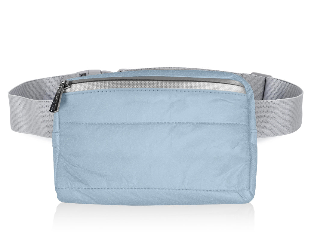 Shimmer ice blue puffer crossbody fanny pack belt bag with gray strap on white background