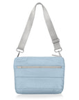Shimmer light blue puffer purse with long gray strap