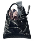 Shimmer black puffer tote bag with pink gym shoes and resistance bands