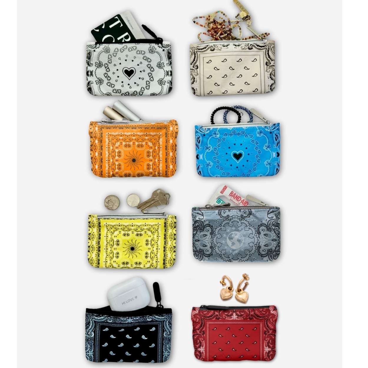 Eight small zip pouches or coin purses arranged in a grid on a light gray background. Each pouch has a different decorative bandana-style print in various colors, including black, beige, orange, blue, yellow, light blue, white, and red.
