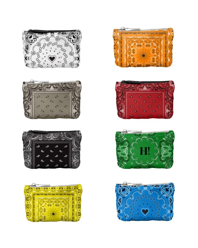 Set of colorful bandana patterned pouches in white, red, orange, beige, black, green, yellow, and blue on a white background