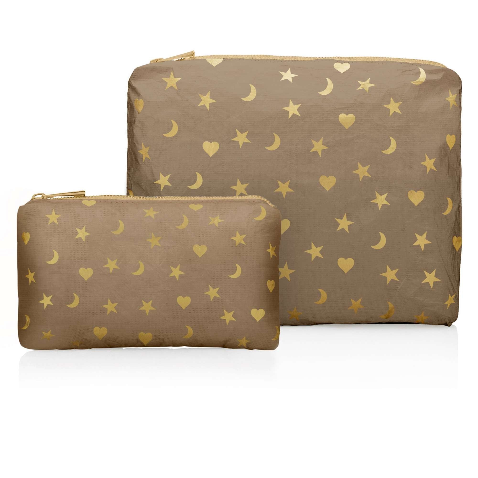 Set of two shimmer bronze zipper pouches with metallic gold heart, moon, and star print, including medium and mini pouch on white background