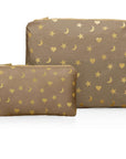 Set of two shimmer bronze zipper pouches with metallic gold heart, moon, and star print, including medium and mini pouch on white background