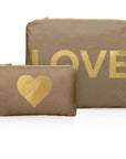 Set of Two Zipper Pouches in Shimmer Bronze featuring a Medium Pouch with gold LOVE lettering and a Mini Pouch with a metallic gold heart.