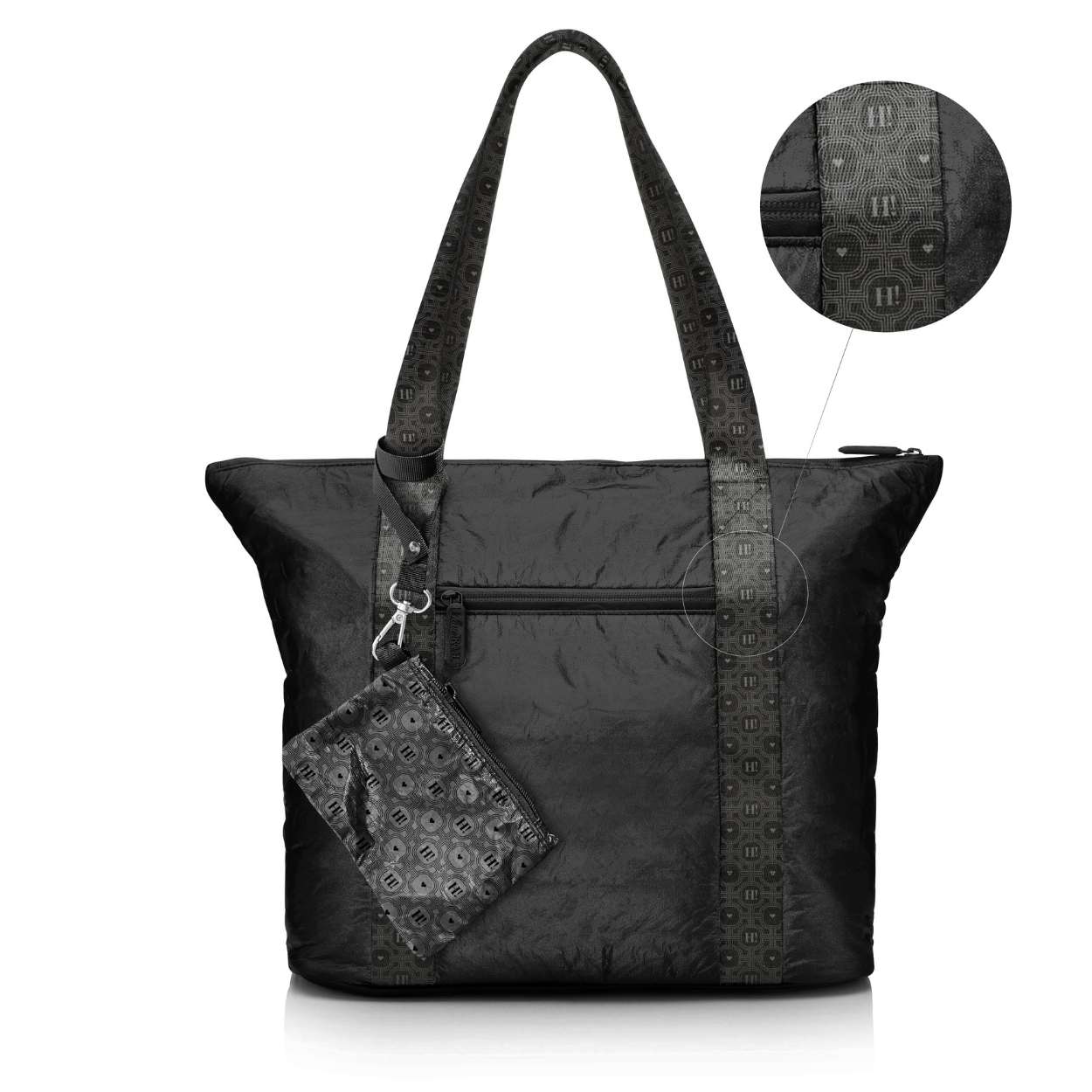 Black signature travel tote with a matching mini pouch, both featuring the brand's signature striped pattern, detail inset shown.