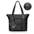 Black signature travel tote with a matching mini pouch, both featuring the brand's signature striped pattern, detail inset shown.