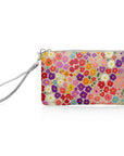 Zip wristlet in colorful poppies pattern on white background