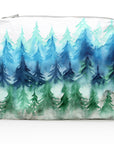 White zipper pouch with watercolor forest trees in various greens and blues