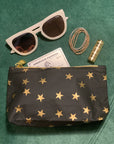 Mini zipper pouch in black with gold stars  for added organization 
