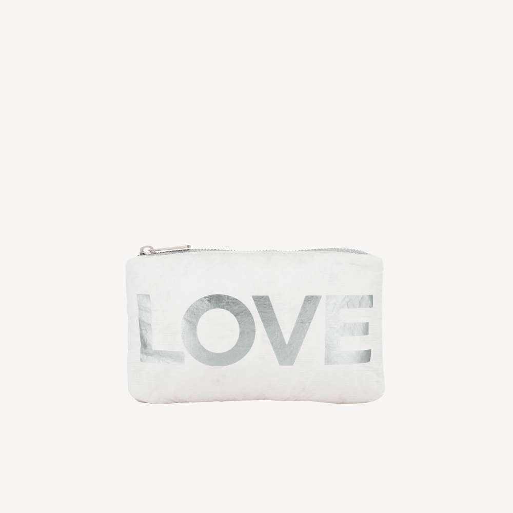 White zipper pouch with silver love print.