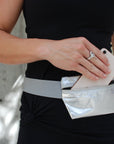 Person Wearing Layflat Fanny Pack Belt Bag in Silver with Gray Strap