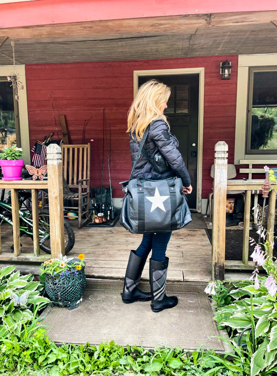 Weekender duffel in black with silver star