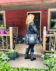 Weekender duffel in black with silver star