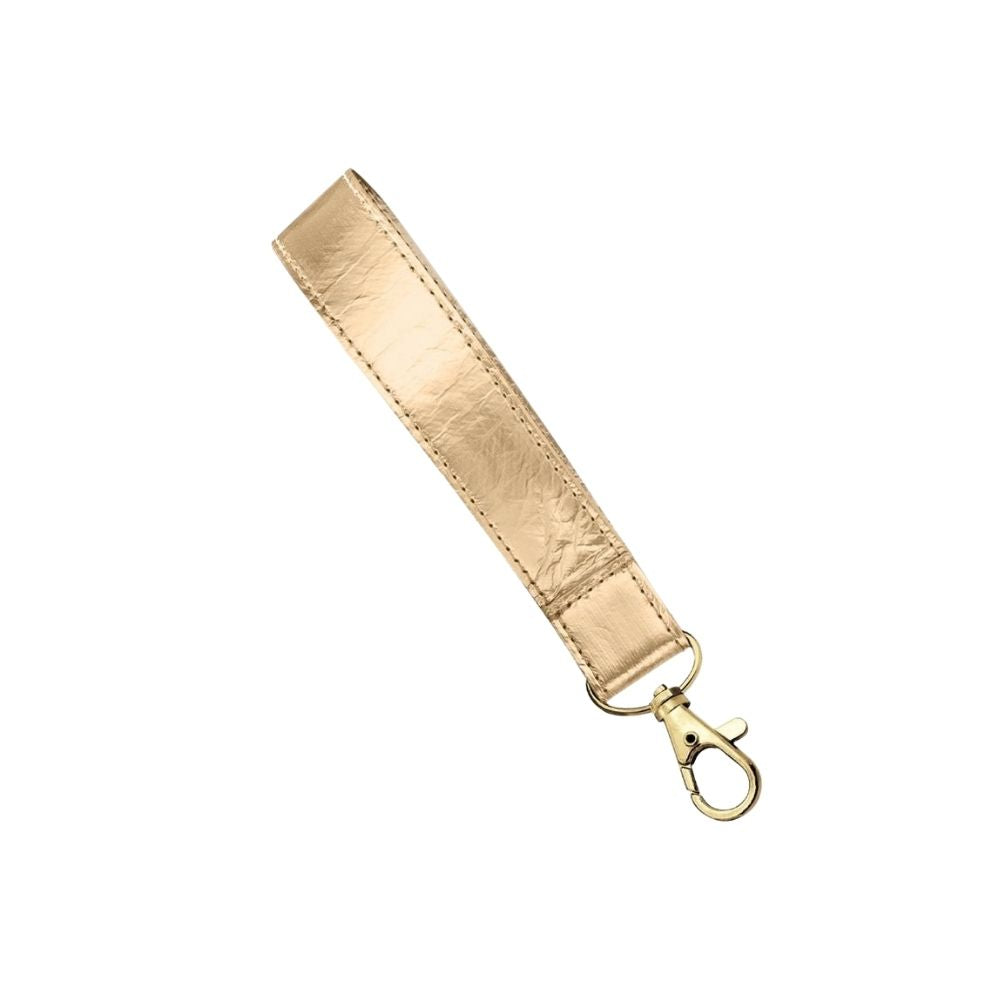 A gold wrist strap with a keychain clasp on a white background.