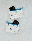 Small pouch set of two in dancing skier and snowboarder pattern
