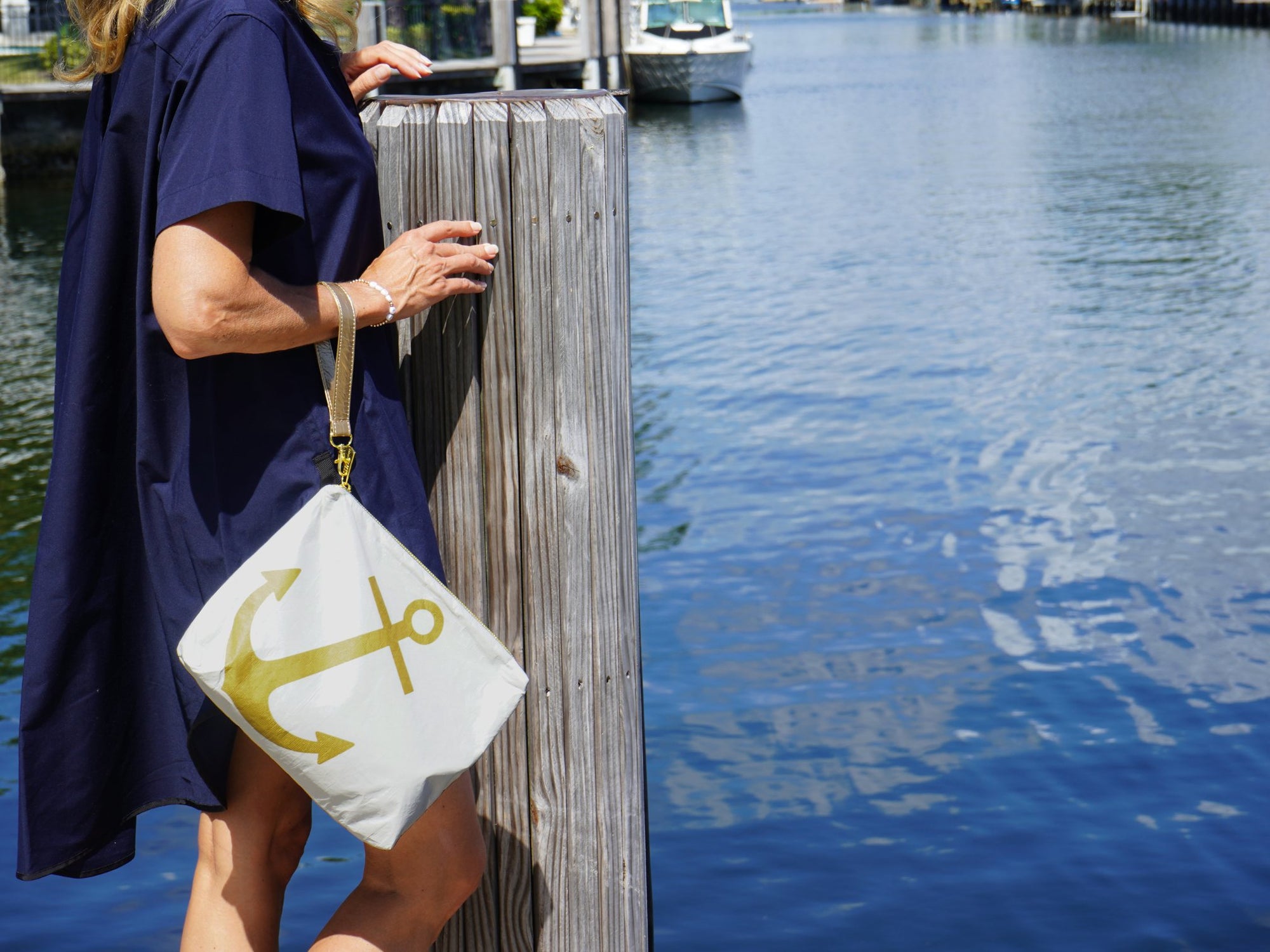 Pouch set in white with gold anchor