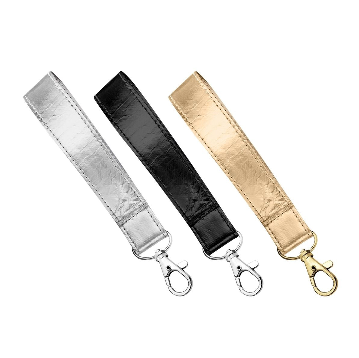 Three wristlet straps in silver, black, and gold colors with keychain attachments.