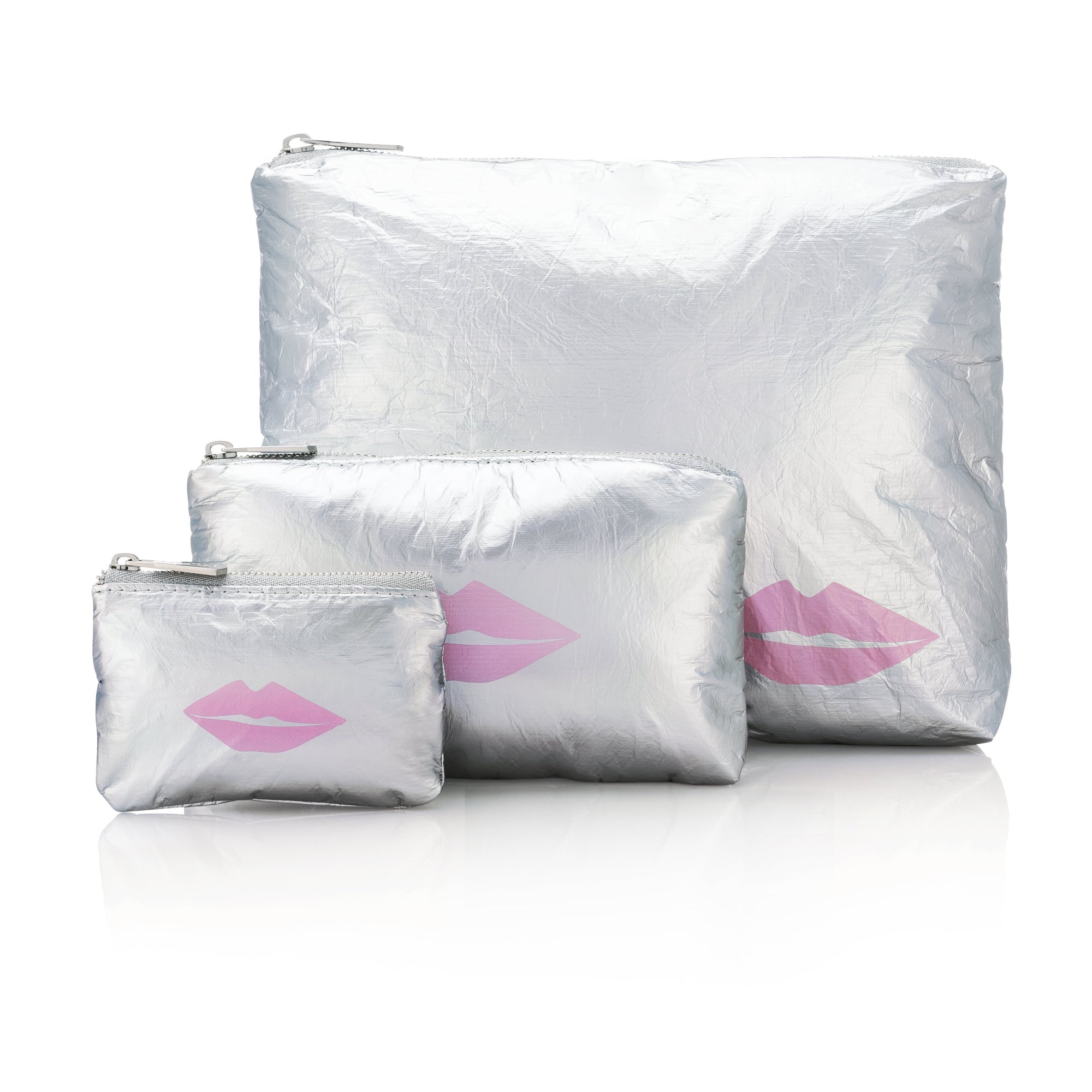Set of three in limited edition silver with pink lip on white background