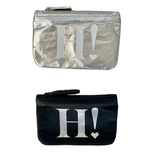 Two compact gift card holders, one silver with the Hi Love logo, and one black with the Hi Love logo, against a white background.