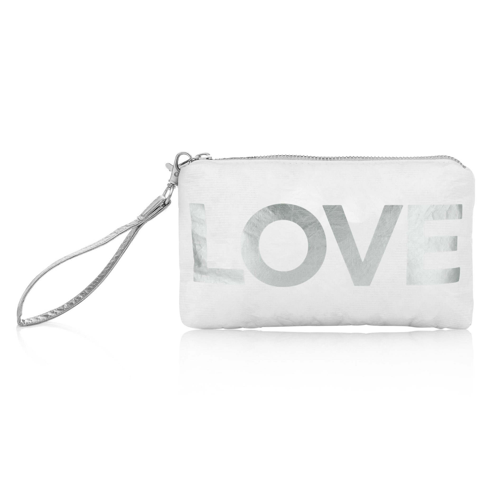 Zip wristlet in shimmer white with silver  "LOVE" with a detachable wrist strap