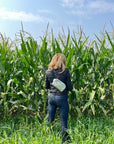 Woman in corn field Puffer Crossbody Fanny Pack Belt Bag in Silver with Black Strap