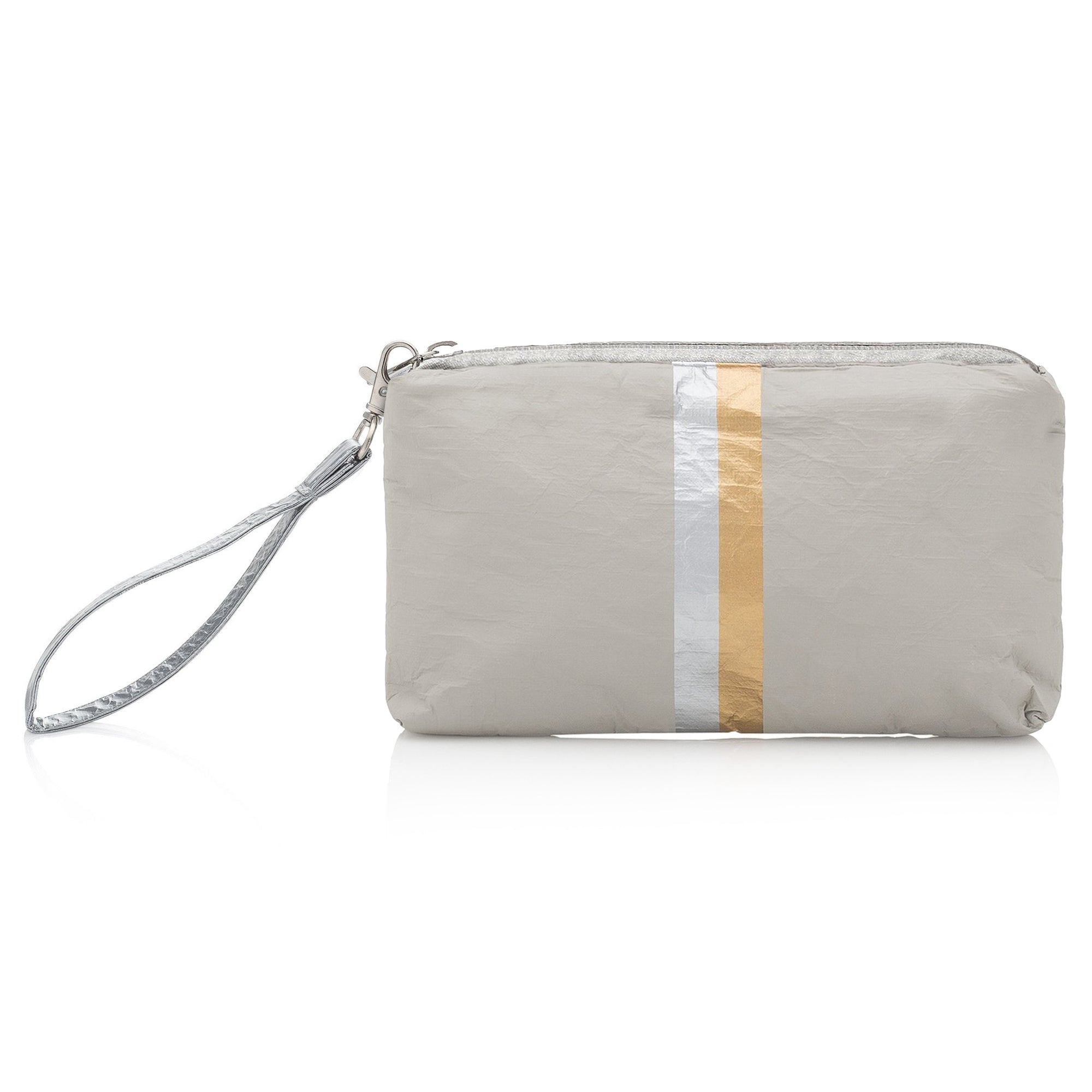 A wristlet pouch with earth gray color, featuring silver and gold vertical stripes, with a detachable wrist strap.