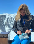 Woman on Mountain using Mini Skier Print Zipper Pouch 