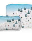 Pouch Set of Two in dancing skiers bluebird sky pattern