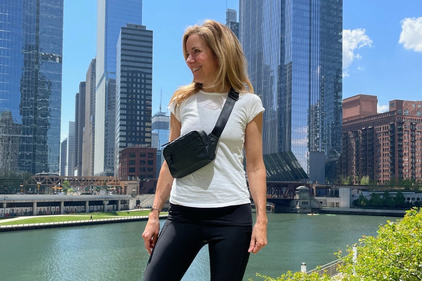 Woman wearing Puffer Crossbody Fanny Pack Belt Bag in Black 